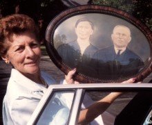 grandma holding ancestor photo cover